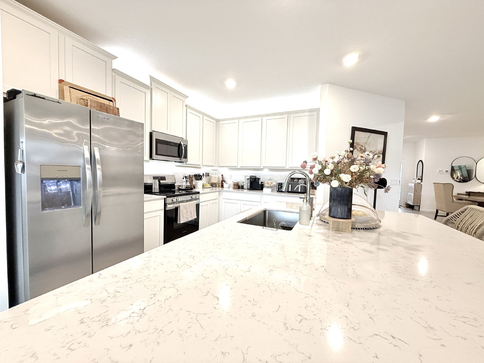 Like-New 4BR in Saddle Oaks | 3-Car Garage + Oversized Lot property image